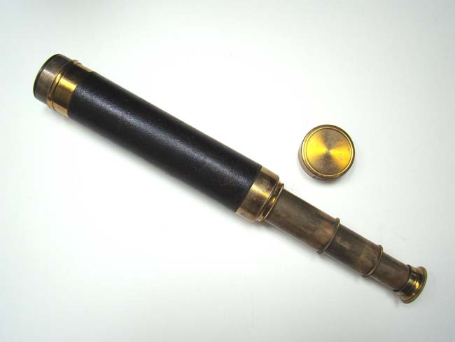 A late 19th century French Three-Draw Telescope with removable lens cover circa 1895